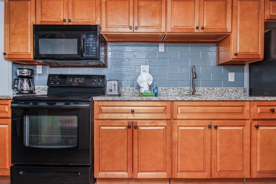 Kitchen or kitchenette, oven, toaster