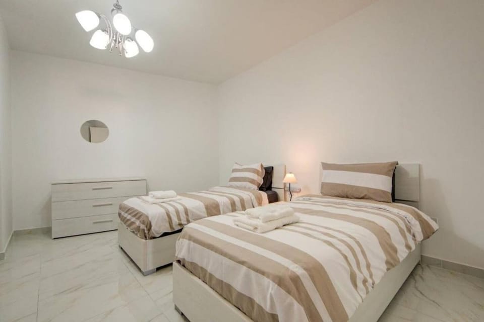 Bright & Modern Three Bedroom near the Sea With Terrace & Sea Views Apartment in Saint Paul's Bay