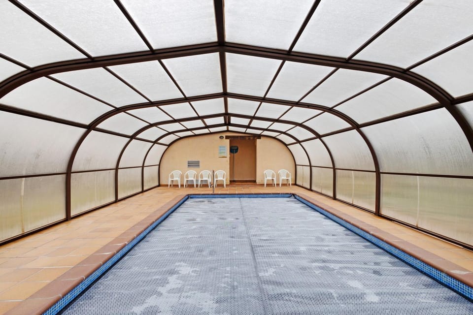 Property building, Living room, Swimming pool