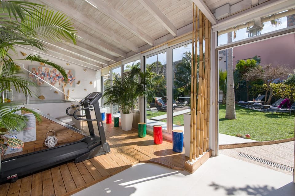 Patio, Fitness centre/facilities, Garden view, Swimming pool