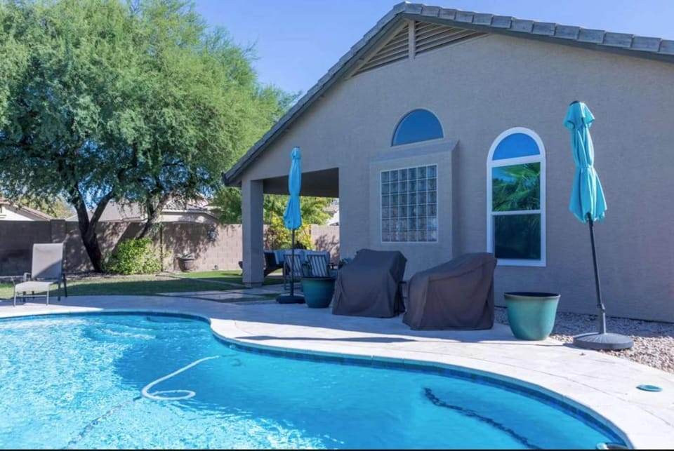 Serene Escape and Modern Comfort Pool Heater BBQ House in Gilbert