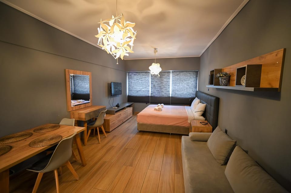 Bed, TV and multimedia, Living room, Seating area