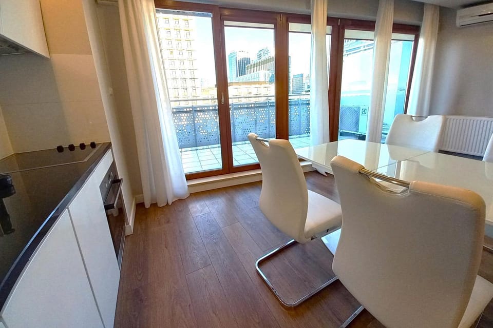 Kitchen or kitchenette, Living room, Seating area, Dining area