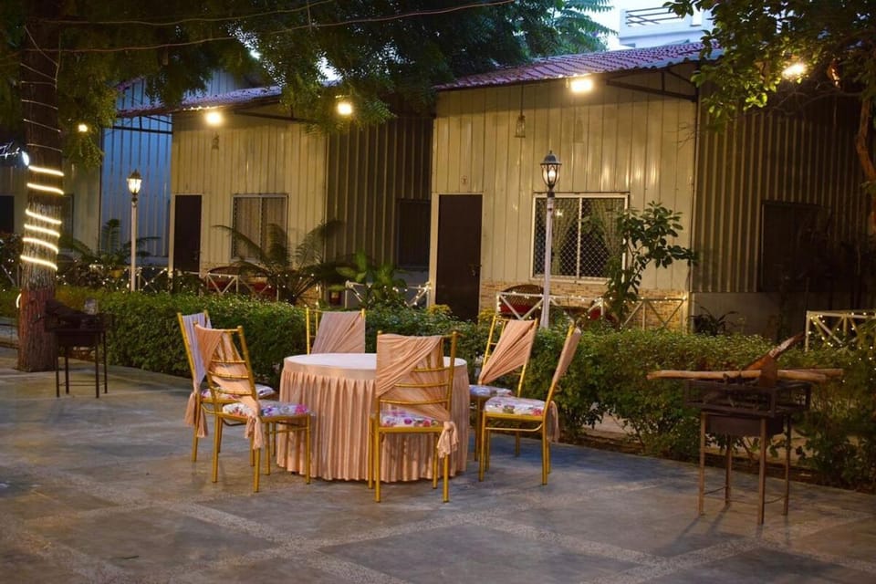 Property building, Patio, Night, Garden, Seating area