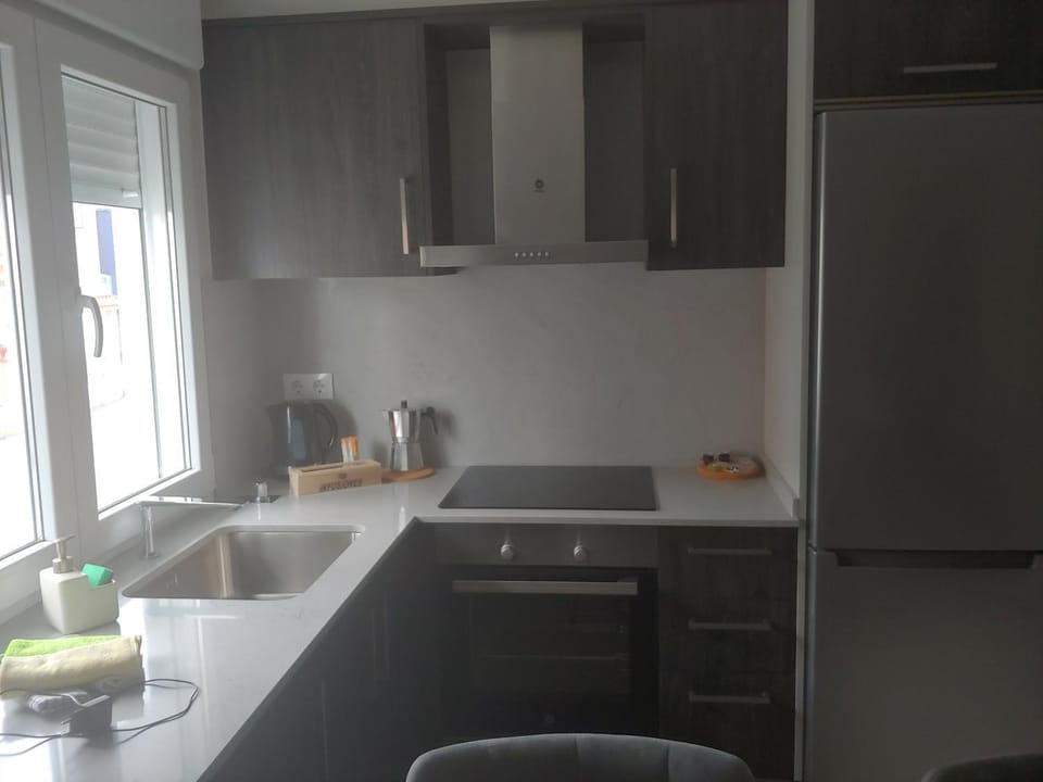 Kitchen or kitchenette, stove