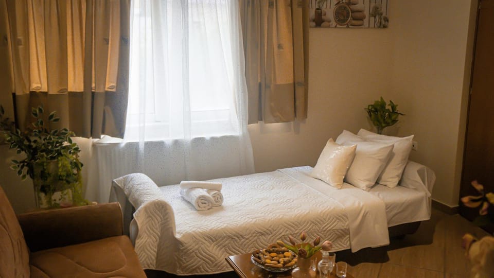 Bed, Living room, Seating area