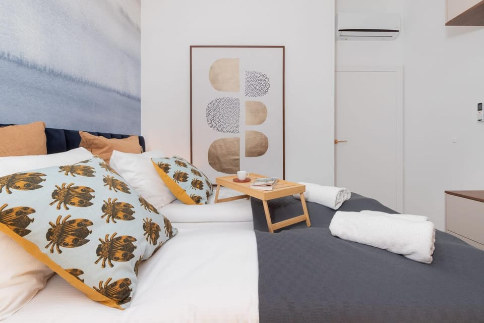 Bed, Photo of the whole room, Bedroom, towels, air conditioner