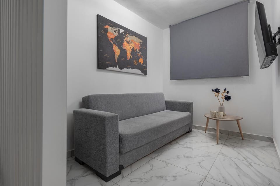 Bed, TV and multimedia, Living room, Seating area