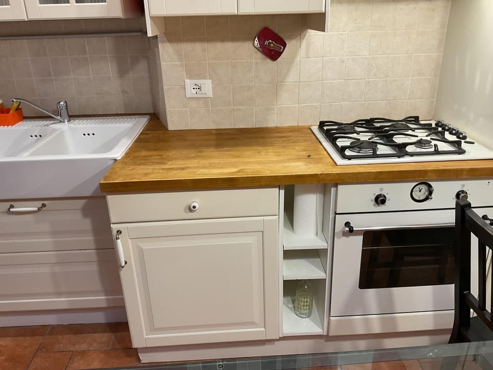 Kitchen or kitchenette, stove