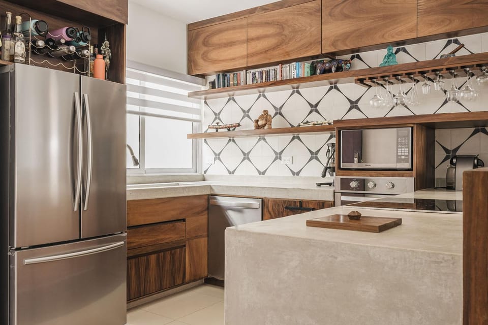 Kitchen or kitchenette, dishwasher, oven, stove