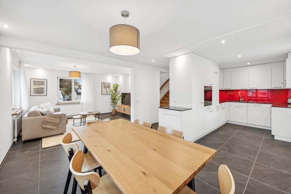 Coffee/tea facilities, Kitchen or kitchenette, Living room, Dining area, furniture, oven, stove, toaster