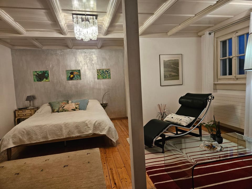 Bed, Seating area, Bedroom
