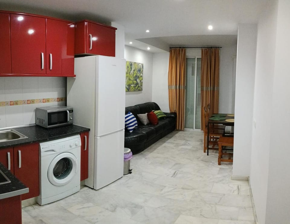 Kitchen or kitchenette, stove, washing machine