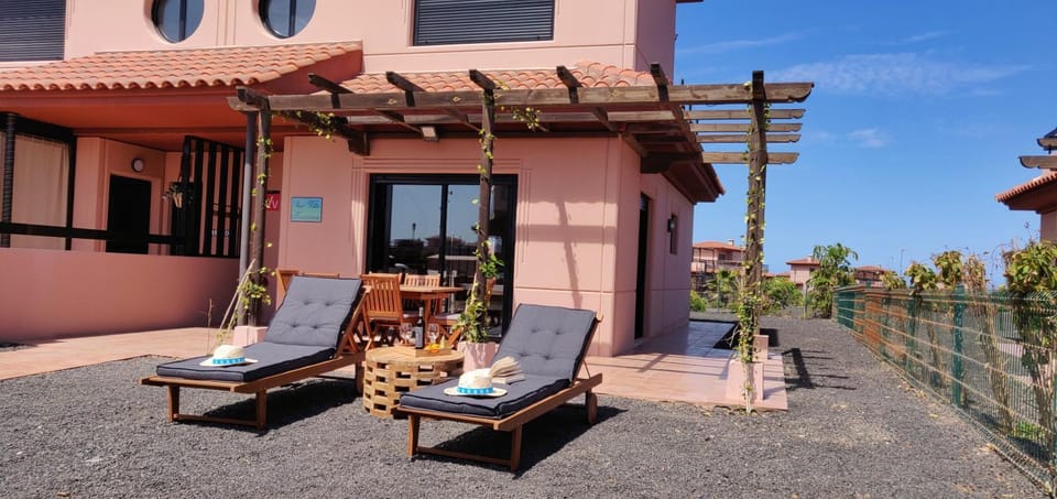 Property building, Patio, Day, View (from property/room), Balcony/Terrace, sunbed