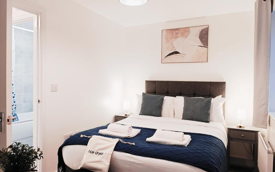 Bed, Bedroom, hair dryier, towels