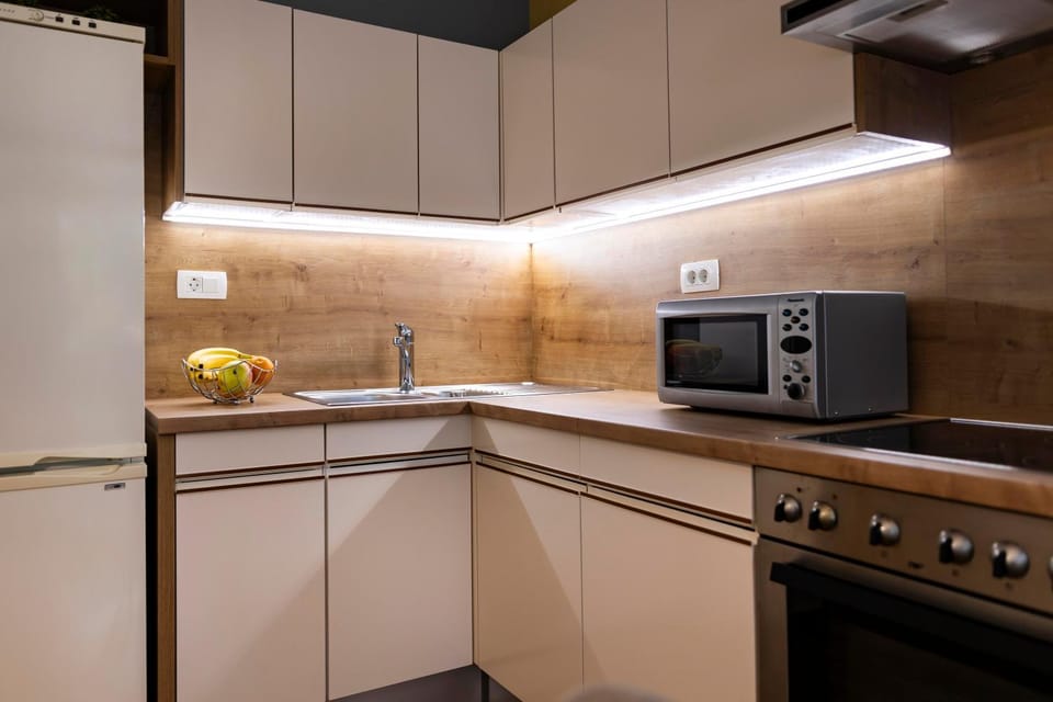 Kitchen or kitchenette, Living room, microwave, oven, stove, kitchen