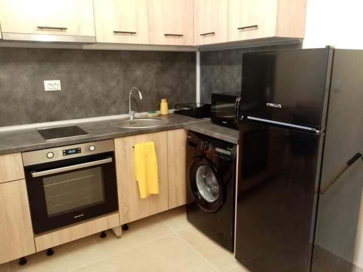 Kitchen or kitchenette, oven, stove