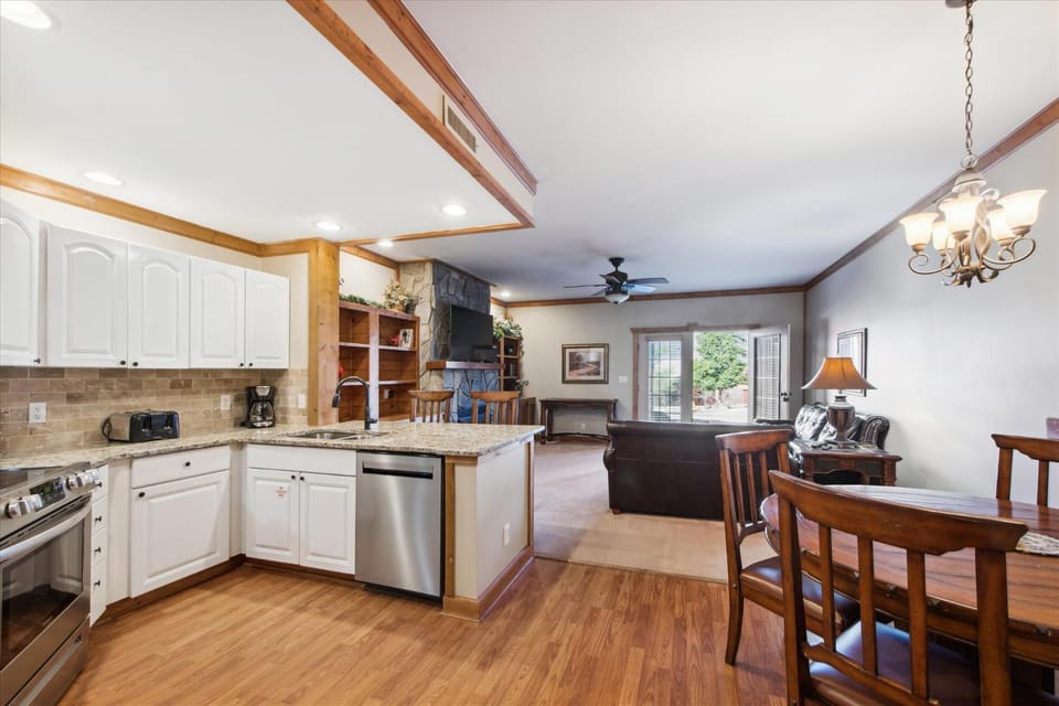 Kitchen or kitchenette, dishwasher, stove