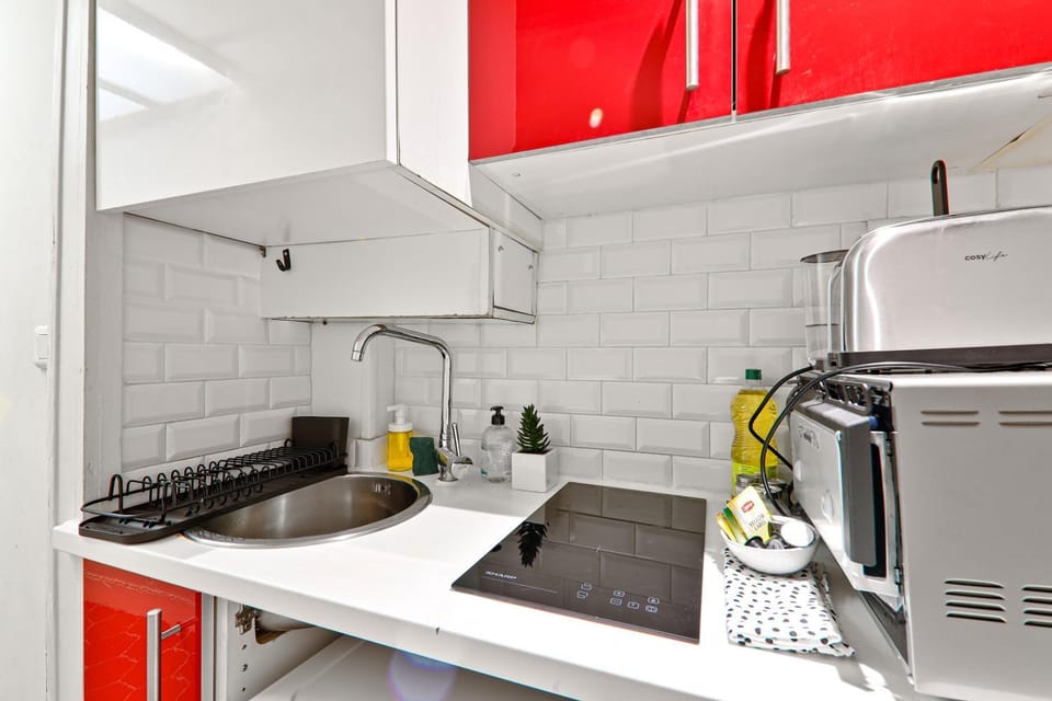 Kitchen or kitchenette, stove, toaster