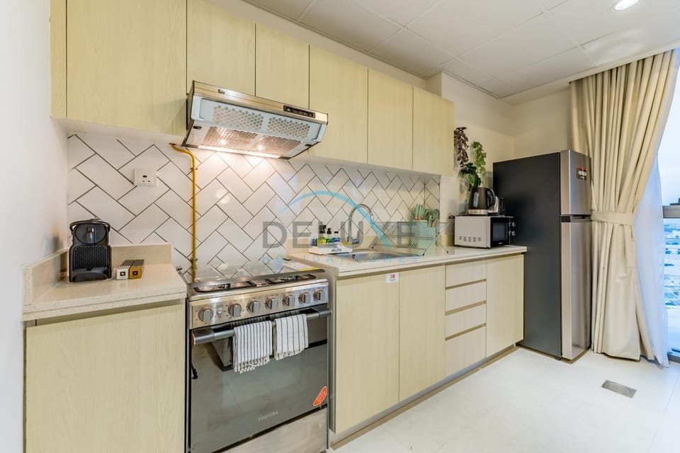 Kitchen or kitchenette, oven, stove, toaster
