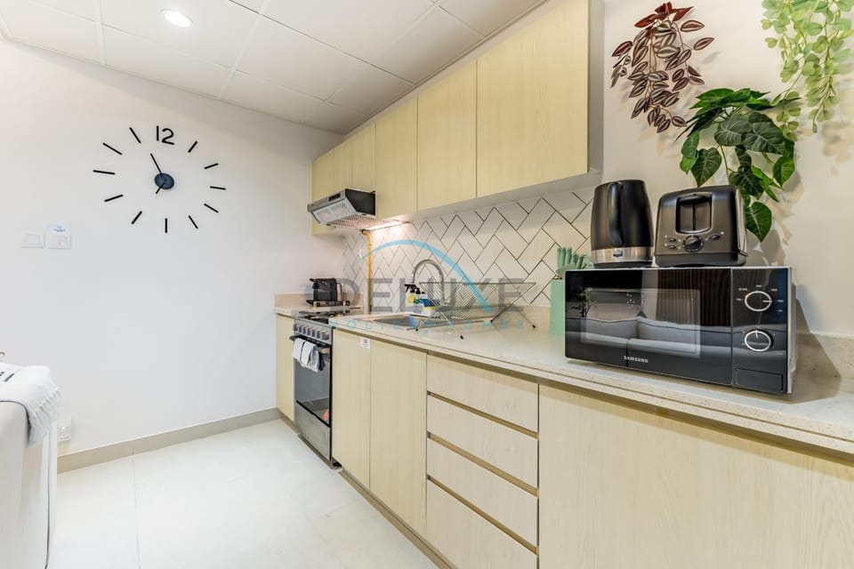 Kitchen or kitchenette, stove, toaster