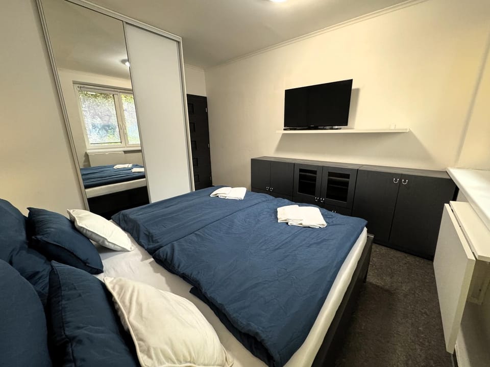Bed, TV and multimedia, Bedroom, towels, wardrobe