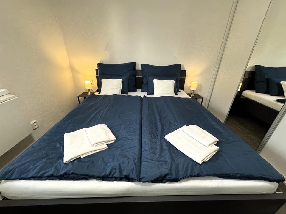 Bed, TV and multimedia, Bedroom, towels, wardrobe