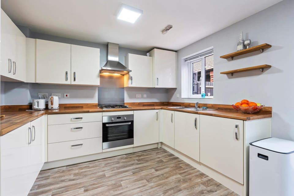 Kitchen or kitchenette, oven, stove, toaster