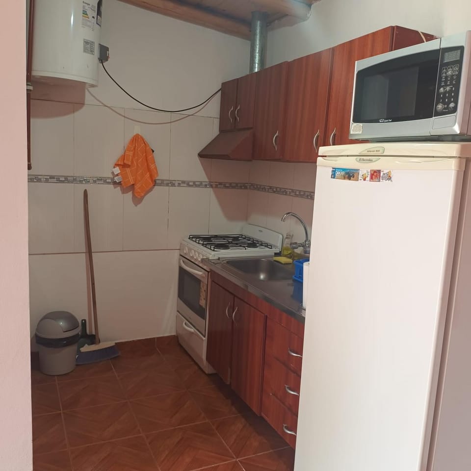 Kitchen or kitchenette, oven, stove