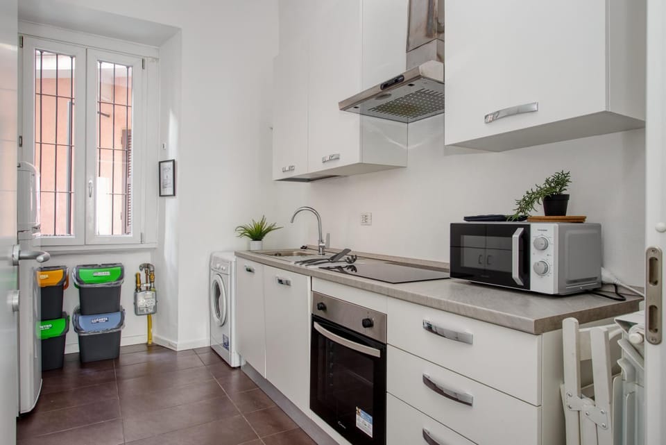 Kitchen or kitchenette, oven, stove, washing machine