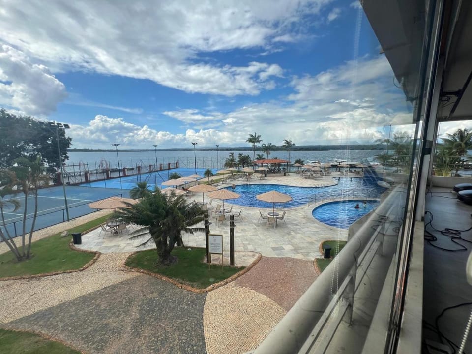 Studio Beira Lago no Premier Residence UH 215 Bloco 4 - LakeSide - Garagem, Academia, Piscina Aquecida, Sauna - 6 min da Esplanada - By Hospede Fácil Apartment in State of Goiás