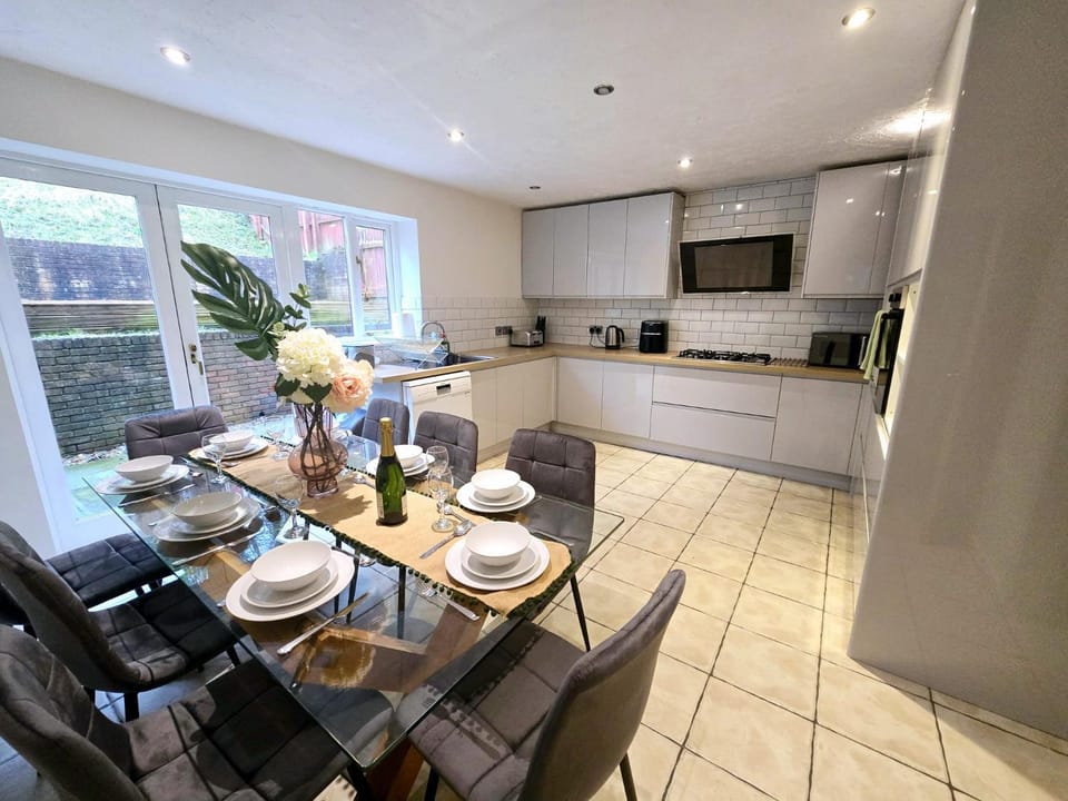 Dining area, dishwasher, microwave, oven, stove, kitchen