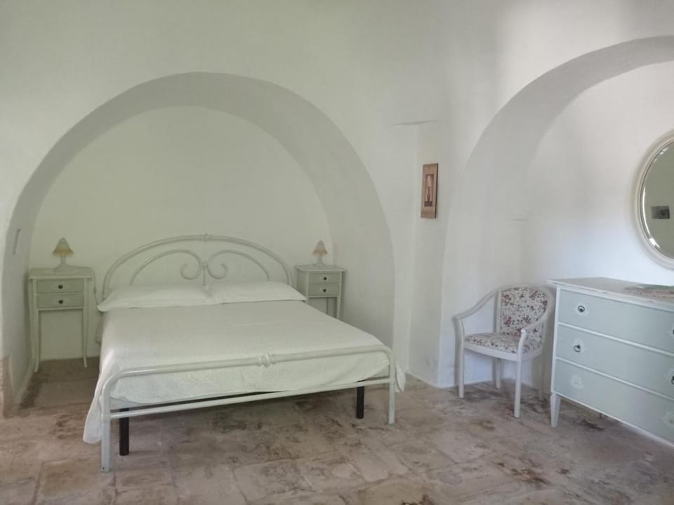 Trulli Melograno immersi nella Valle D'Itria House in Province of Taranto
