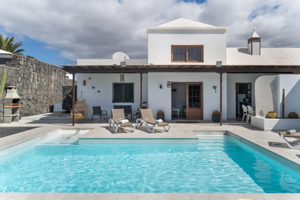 Property building, Living room, Swimming pool