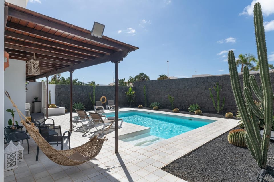 Property building, Living room, Swimming pool