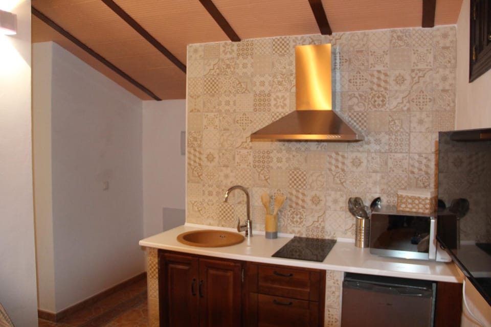 Kitchen or kitchenette, stove