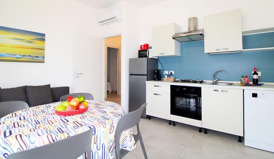 TV and multimedia, Kitchen or kitchenette, Living room, Dining area, dishwasher, microwave, air conditioner