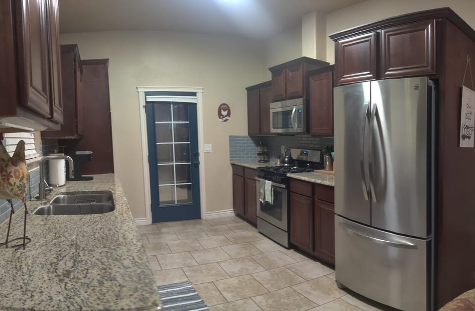 Kitchen or kitchenette, oven, stove, toaster