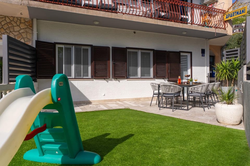 Property building, Patio, Seating area, Dining area