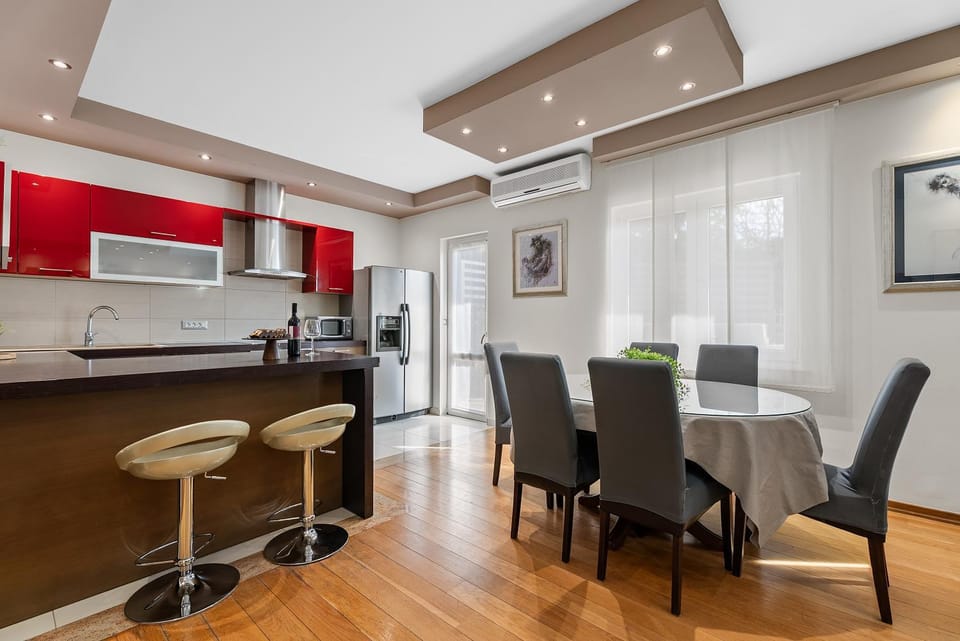 Kitchen or kitchenette, Seating area, Dining area, oven, stove, air conditioner
