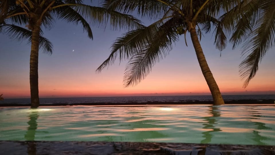 Property building, Natural landscape, Pool view, Sea view, Swimming pool, Sunset