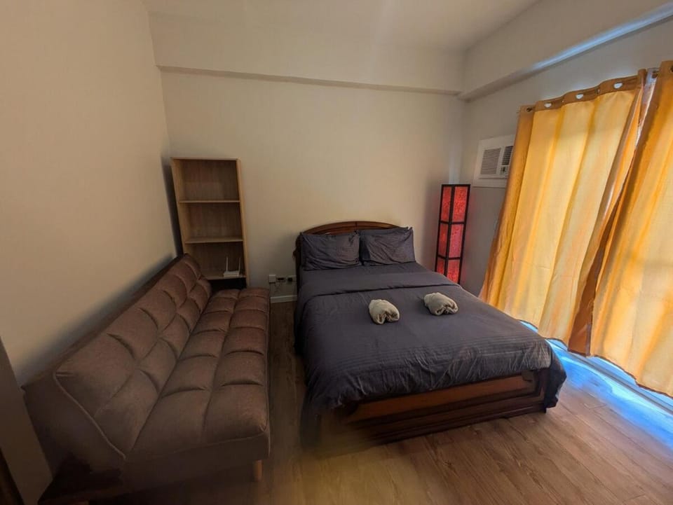Near Airport Luxury on a Budget Gym, Pool, 55 Smart TV, Balcony facing amenities Apartment in Lapu-Lapu City