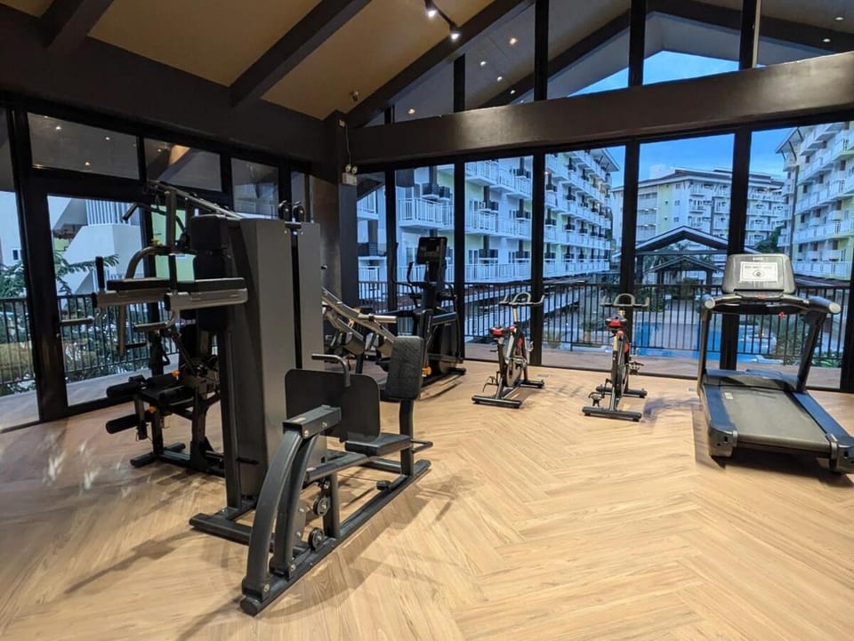 Near Airport Luxury on a Budget Gym, Pool, 55 Smart TV, Balcony facing amenities Apartment in Lapu-Lapu City