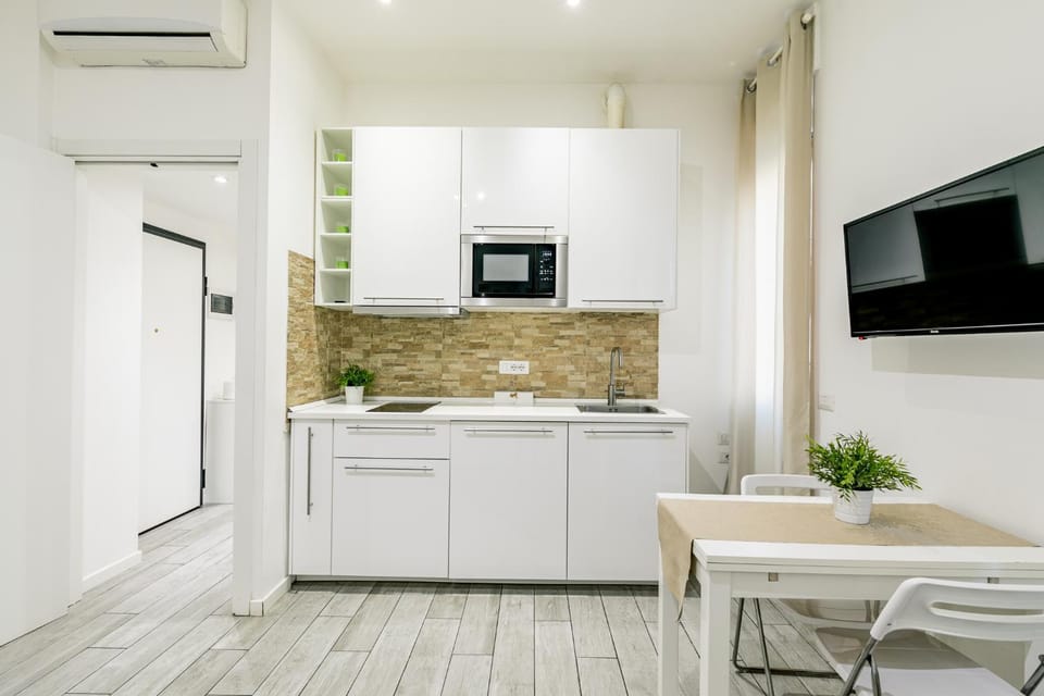 TV and multimedia, Kitchen or kitchenette, Living room, Dining area, minibar, stove, air conditioner