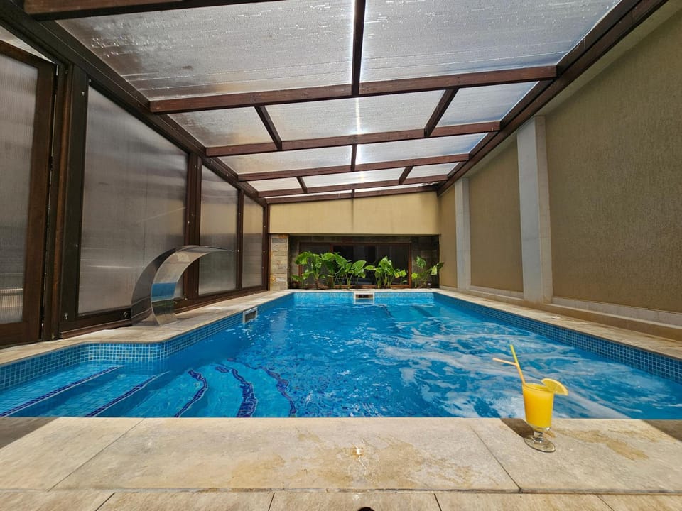 View (from property/room), Decorative detail, Pool view, Swimming pool, Swimming pool, Drinks