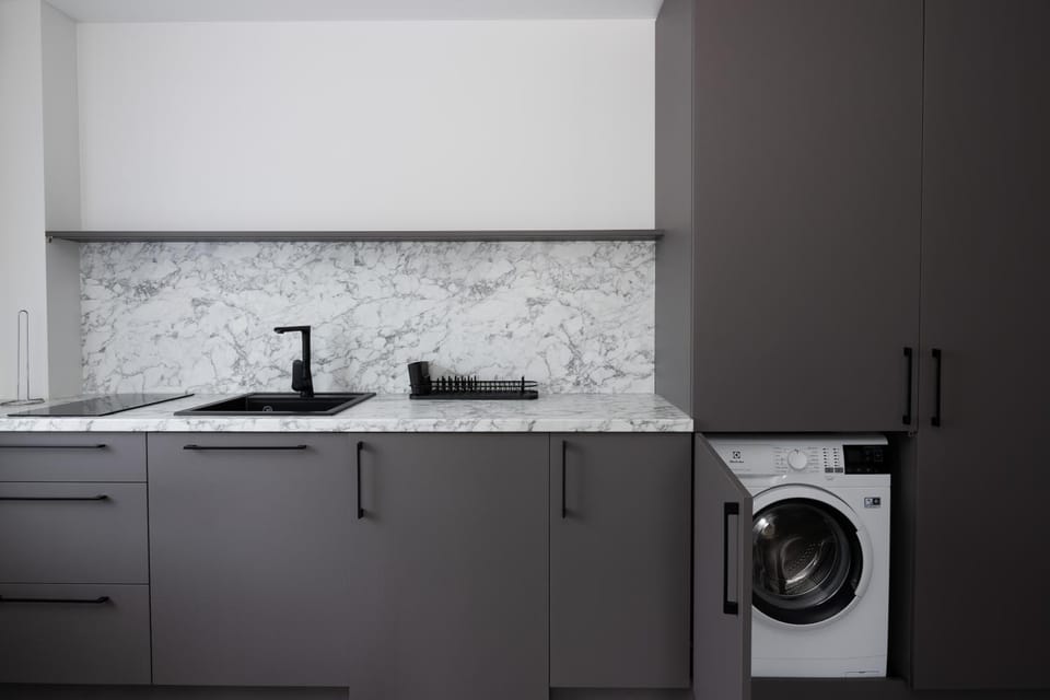 Kitchen or kitchenette, washing machine