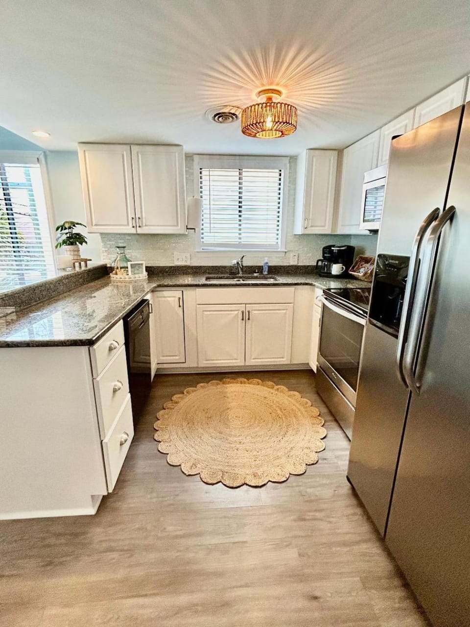 Kitchen or kitchenette, dishwasher, oven, stove