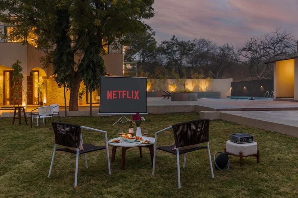 Property building, Patio, Communal lounge/ TV room, Day, Night, Natural landscape, Garden, Living room, Seating area, Evening entertainment, Garden view