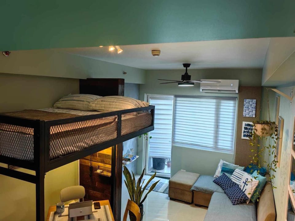 Communal lounge/ TV room, Bed, Living room, Seating area, Bedroom, bunk bed, air conditioner