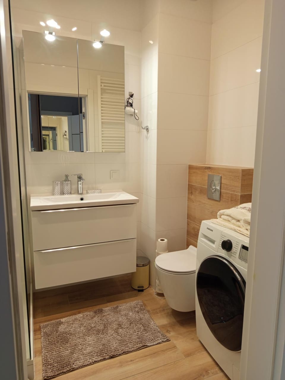 Shower, Toilet, Bathroom, towels, washing machine, dryer